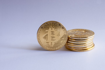 Stack of isolated Bitcoins on white background