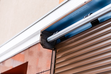 Window with closed roller shutter closeup