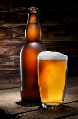Beer on wooden background