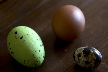 hen and quail eggs with an easter egg