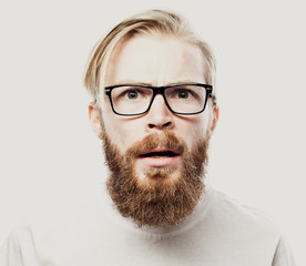 Bearded hipster young man wearing glasses  isolated on white background