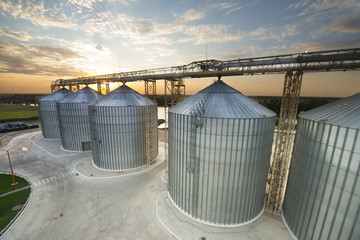 metal tanks for storage of grain (elevator) - obrazy, fototapety, plakaty