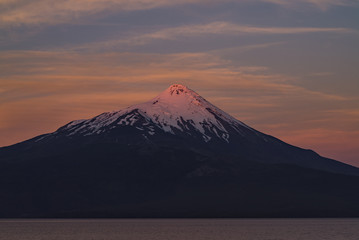 Beautiful sunset at a viewpoint in Ensenada located opposite the Osorno volcano, Puerto Varas, southern Chile
