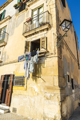 Facade of an old classical building in Siracusa, Sicily, Italy