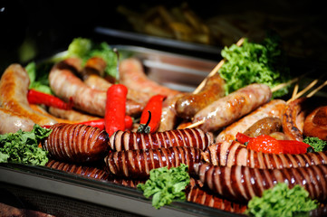 Grilled sausage close-up .