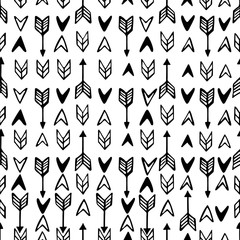 Monochrome arrow signs seamless pattern. Hand drawn doodle arrow symbols on white background. Cute bohemian pattern for your design.