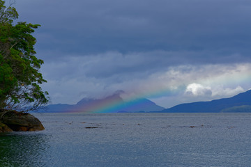 Patagonian landscape with a rainbow background product of moisture in the air