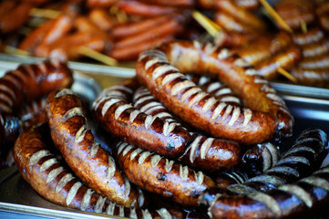 Grilled sausage close-up .
