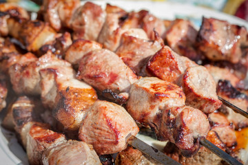 Grilled shish kebab or shashlik pork on skewers closeup. 