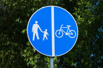 Bicycle road and pavement road sign.