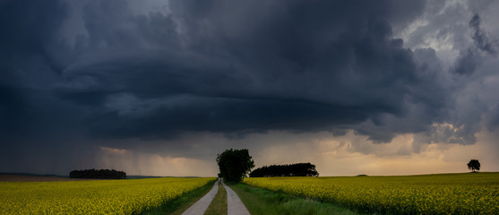 approaching storm over a country road