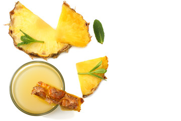 Naklejka premium healthy background. Sliced ripe pineapple with juice isolated on white background. top view