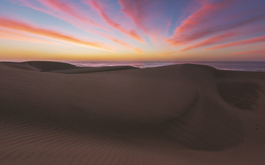 Famous natural park Maspalomas dunes in Gran Canaria at sunrise, Canary island, Spain