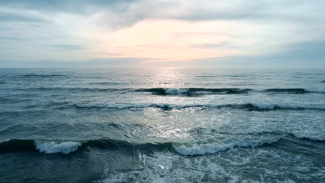 Waves at Seaside at Sunset, Slow Motion Aerial View