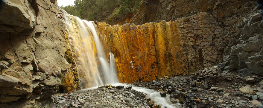 Waterfall of Cascada de los Colores in caldera of Taburiente, island of La Palma, Canary Islands