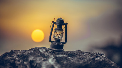 Lantern Lamp On Stone At Dawn	