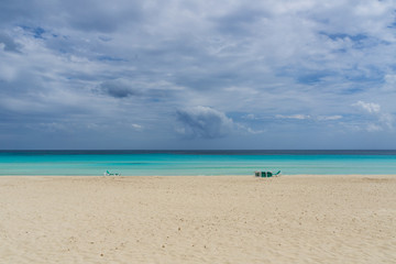 Naklejka na ściany i meble Mallorca, Perfect blue water on beach paradise with canvas chairs