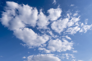 Blue Sky with white Clouds as Background