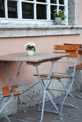 Outdoor cafe table in old European city
