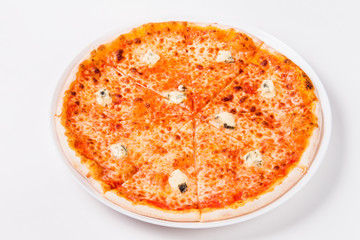 pizza with blue cheese in a circular white plate on a light background