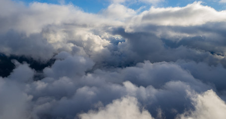 Valleys of the Andes mountain range covered with clouds in the morning