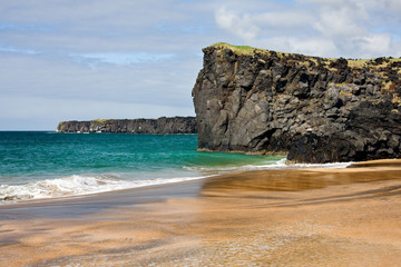 Golden Bay Of Skardsvik In Iceland