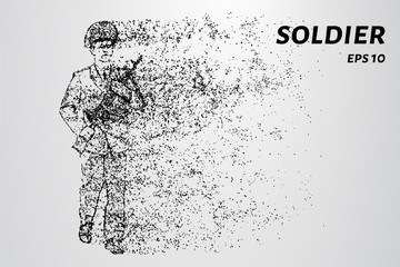 Fototapeta na wymiar Soldiers wind breaks particles. A soldier with a gun marching