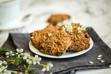 oatmeal cookies with a cup of coffee