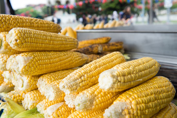 corn stuff is selling some corn in the street