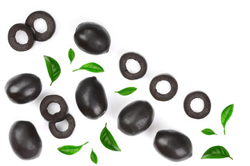 whole and sliced black olives decorated with leaves isolated on white background. Top view. Flat lay pattern