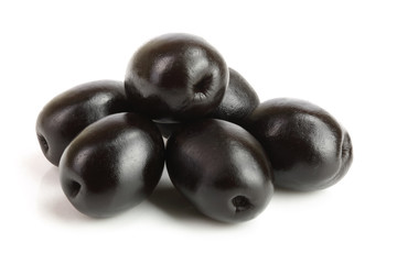 whole black olives isolated on white background macro