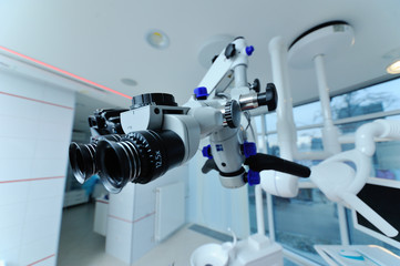 Fototapeta na wymiar Dental microscope on the background of modern dentistry. Medical equipment