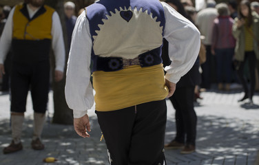 Rear view of a man wearing traditional costume