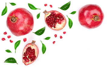 pomegranate with leaves isolated on white background with copy space for your text. Top view. Flat lay pattern