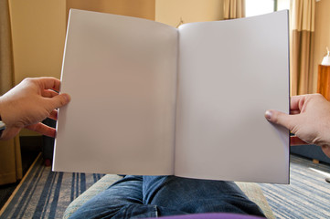 Man relaxing and reading - point of view perspective