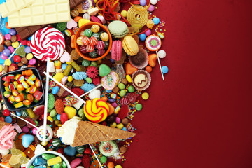 candies with jelly and sugar. colorful array of different childs sweets and treats