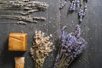 Lavender soap on black wooden table background