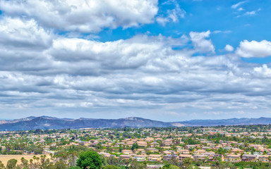 Fototapeta premium White clouds cover eastern boundary of California inland empire