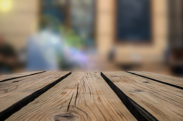 Wooden board empty table in restaurant