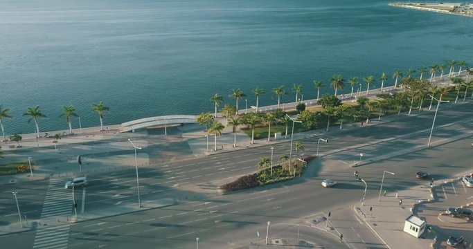 Aerial footage of Luanda's bay with sunset.