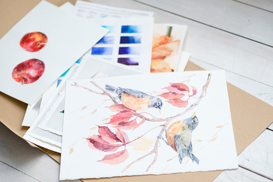 art painting inspiration creativity nature concept. picture of birds. drawing creations. folder full of paintings on paper