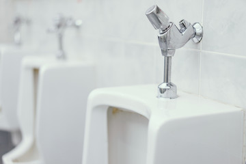 Urinal in the male toilet inside the oil service.