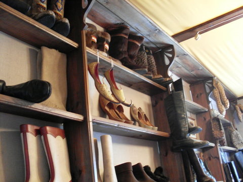 arrangement Art and Craft Choice collection for sale Hanging indoors large group of objects no people order rack retail retail display Sale shelf shelves Shoe still life store variation wood - materia