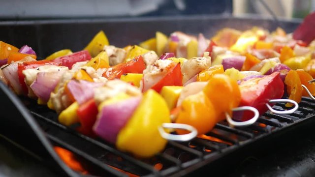 Grilling Kebabs on the grill with barbecue sauce