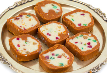 Indian Sweet Colourful Mawa Peda Also know as pedha or peday Indian Popular Sweet Food Made up of Mawa, Milk and Sugar isolated on white background