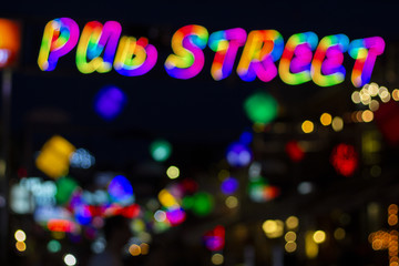 Pub Street in Siem Reap, Cambodia - blurry abstract photo of colorful night lights. Outdoor night...
