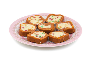 Indian Sweet Colourful Mawa Peda Also know as pedha or peday Indian Popular Sweet Food Made up of Mawa, Milk and Sugar isolated on white background