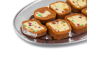 Indian Sweet Colourful Mawa Peda Also know as pedha or peday Indian Popular Sweet Food Made up of Mawa, Milk and Sugar isolated on white background