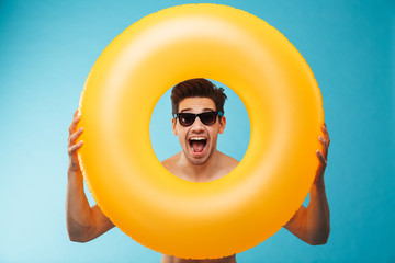 Close up of a cheerful man in sunglasses