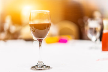 Glass of red wine on the table.